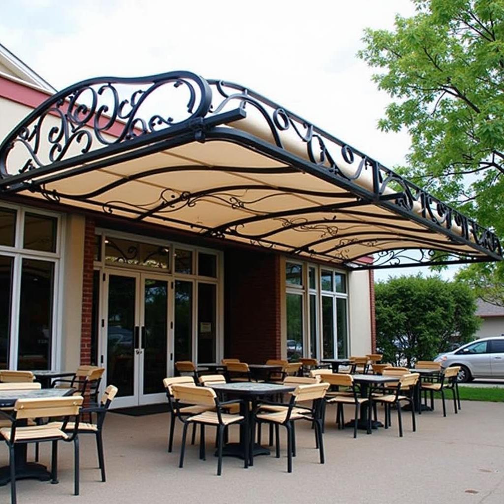 Mẫu mái che sắt mỹ thuật độc đáo cho quán cafe ngoài trời, khung sắt tạo hình nghệ thuật, kết hợp mái bạt kéo linh hoạt